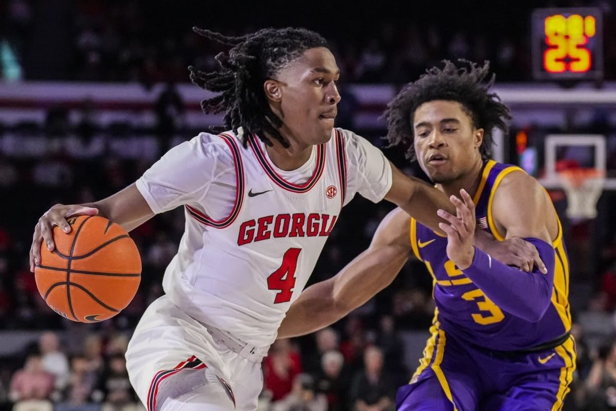 Jan 24, 2024; Athens, Georgia, USA; Georgia Bulldogs guard Silas Demary Jr. (4) dribbles against LSU Tigers guard Jalen Cook (3) during the first half at Stegeman Coliseum.