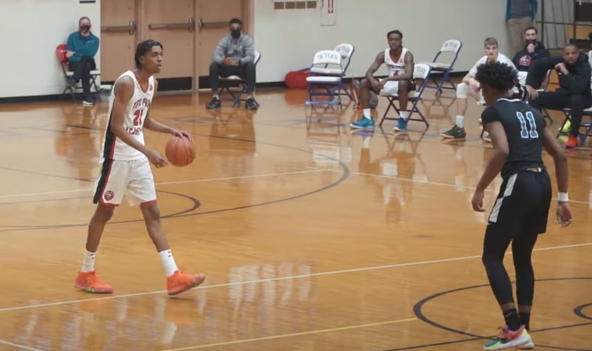 Emoni Bates, left, is a walking highlight reel at age 17.