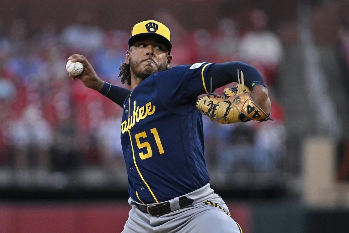 Sep 18, 2023; St. Louis, Missouri, USA;  Milwaukee Brewers starting pitcher Freddy Peralta (51) pitches against the St. Louis Cardinals during the first inning at Busch Stadium.