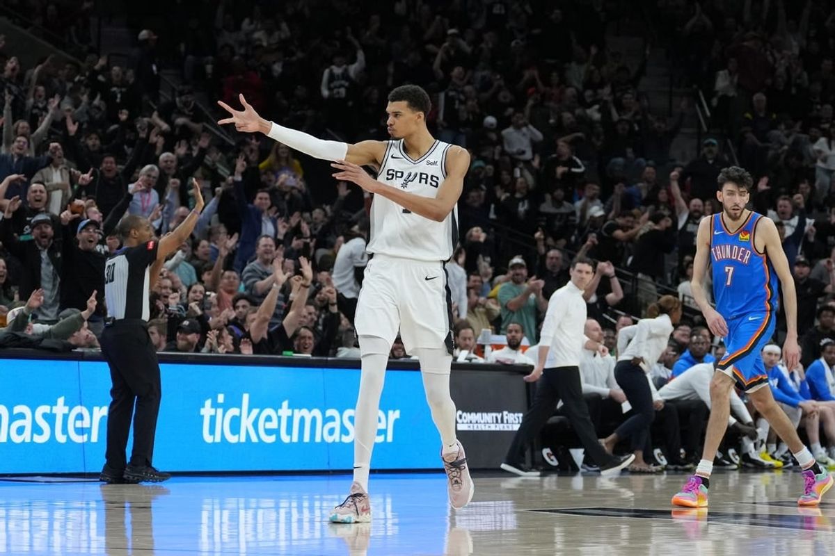 Feb 29, 2024; San Antonio, Texas, USA;  San Antonio Spurs center Victor Wembanyama (1) celebrates a three point shot in the second half against the Oklahoma City Thunder at Frost Bank Center.
