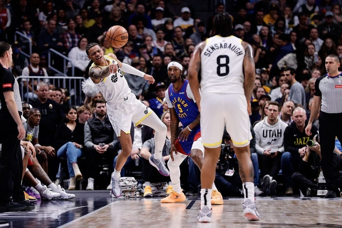 Mar 9, 2024; Denver, Colorado, USA; Utah Jazz guard Keyonte George (3) passes the ball to forward Brice Sensabaugh (8) as Denver Nuggets guard Kentavious Caldwell-Pope (5) defends in the third quarter at Ball Arena.