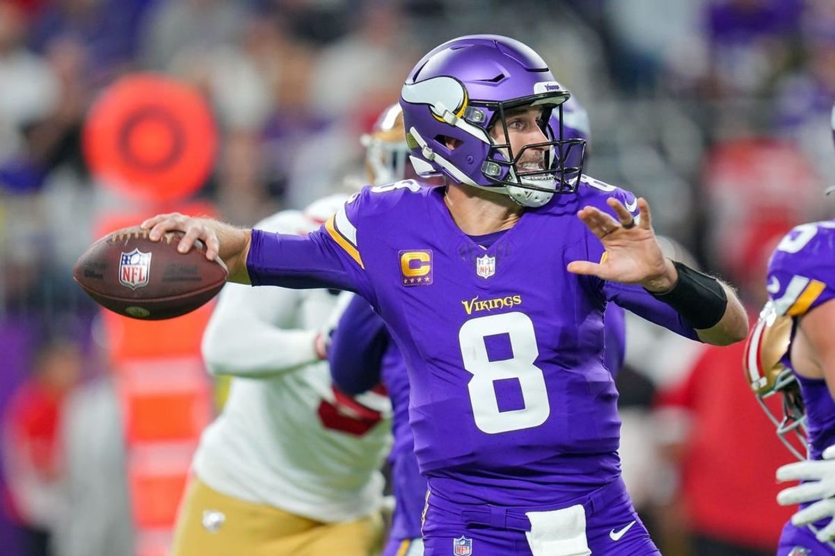 Oct 23, 2023; Minneapolis, Minnesota, USA; Minnesota Vikings quarterback Kirk Cousins (8) passes against the San Francisco 49ers in the first quarter at U.S. Bank Stadium.
