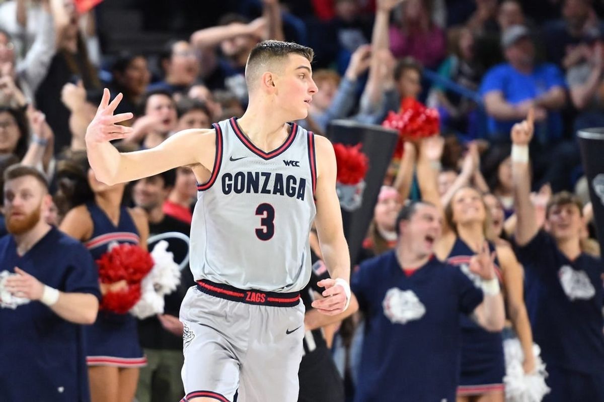 Feb 7, 2024; Spokane, Washington, USA; Gonzaga Bulldogs guard Luka Krajnovic (3) celebrates a three-pointer against the Portland Pilots in the second half at McCarthey Athletic Center. Gonzaga Bulldogs won 96-64.