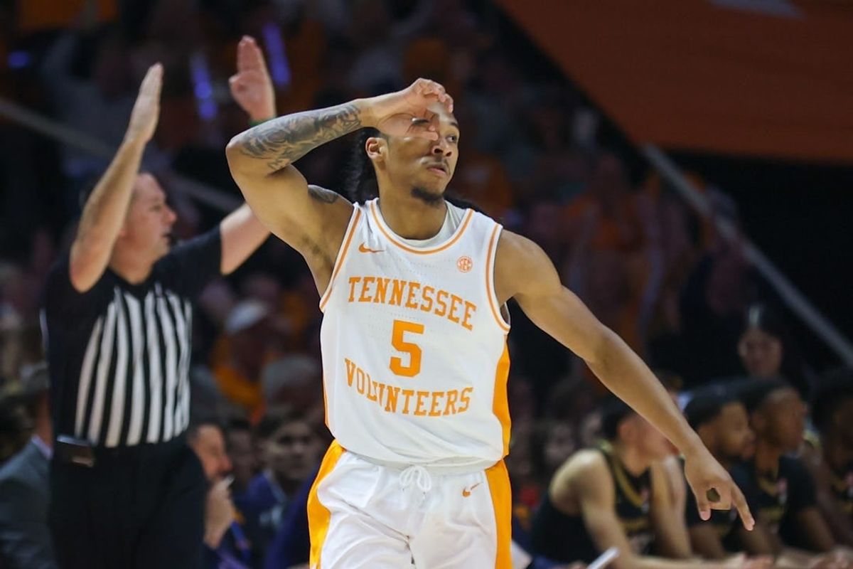 Feb 17, 2024; Knoxville, Tennessee, USA; Tennessee Volunteers guard Zakai Zeigler (5) reacts after shooting for three points against the Vanderbilt Commodores during the first half at Thompson-Boling Arena at Food City Center.