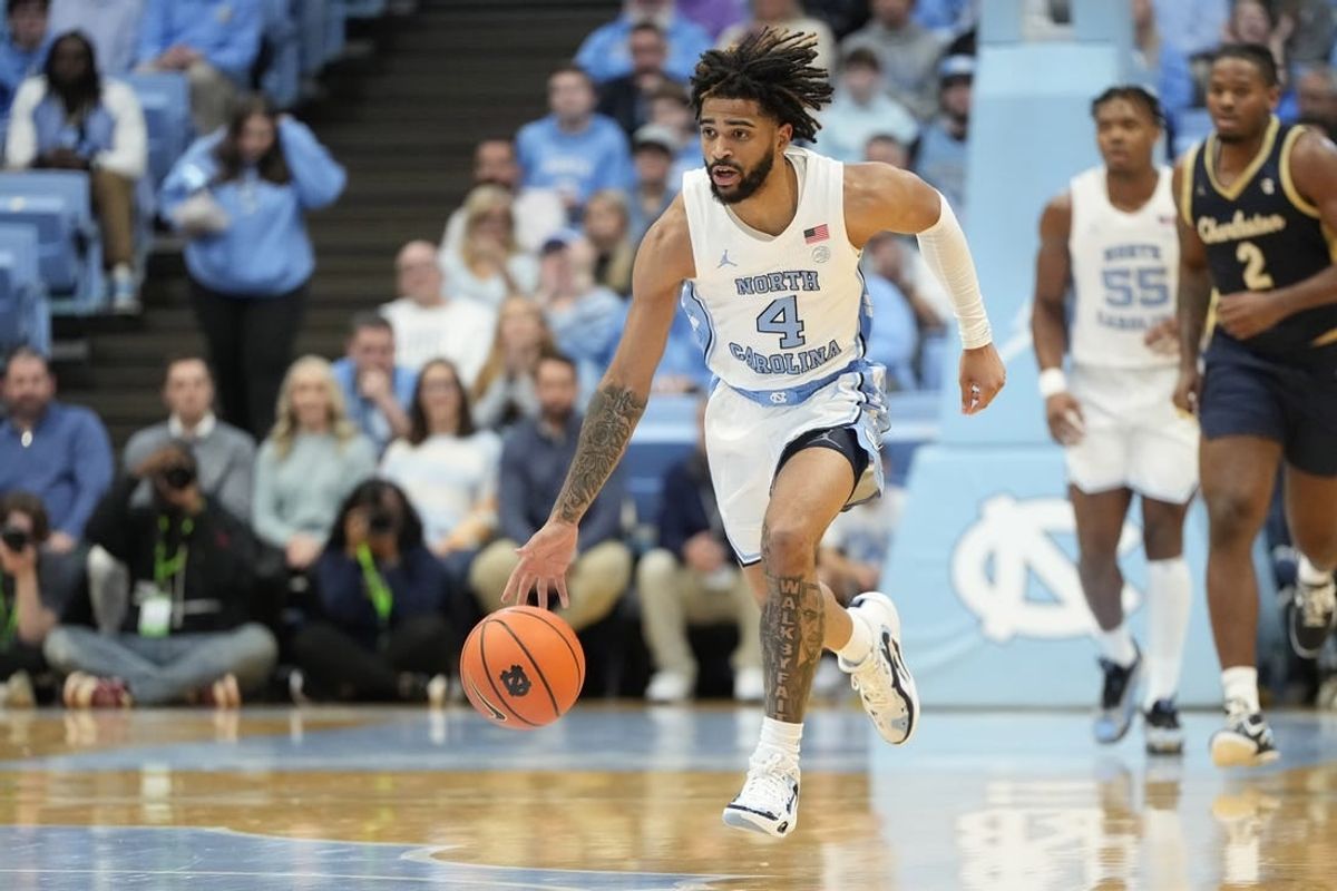 Dec 29, 2023; Chapel Hill, North Carolina, USA; North Carolina Tar Heels guard RJ Davis (4) on the fast break in the second half at Dean E. Smith Center.