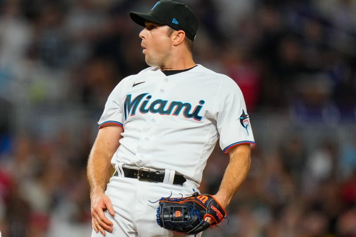 Aug 14, 2023; Miami, Florida, USA; Miami Marlins relief pitcher David Robertson (19) reacts to a call from the umpire against the Houston Astros during the ninth inning at loanDepot Park.