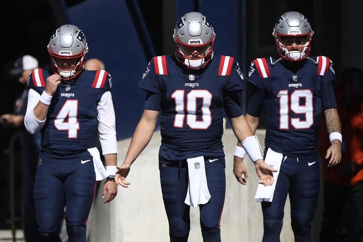 Oct 8, 2023; Foxborough, Massachusetts, USA; New England Patriots quarterback Bailey Zappe (4) quarterback Mac Jones (10) and quarterback Will Grier (19) walk out of the tunnel prior to a game against the New Orleans Saints at Gillette Stadium.