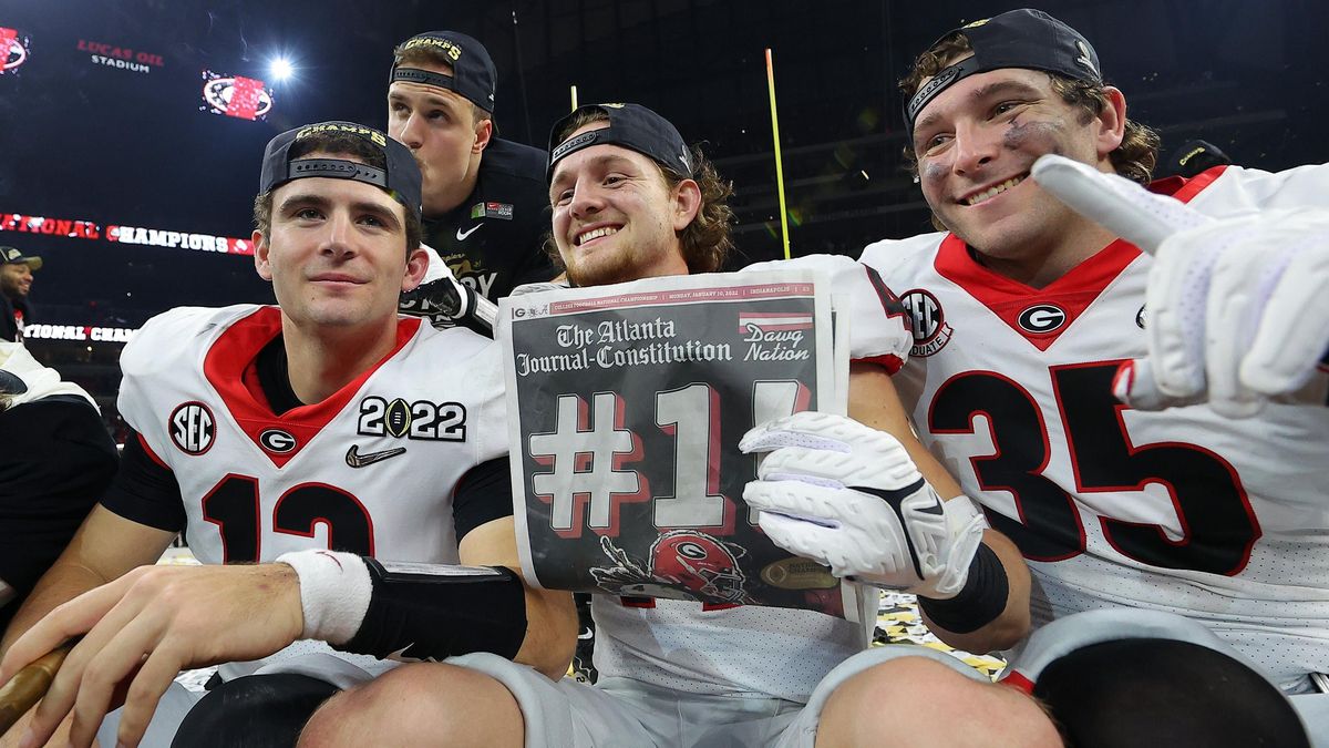 Georgia Bulldogs players celebrate after the Georgia Bulldogs defeated the Alabama Crimson Tide 33-18 in the 2022 CFP National Championship Game