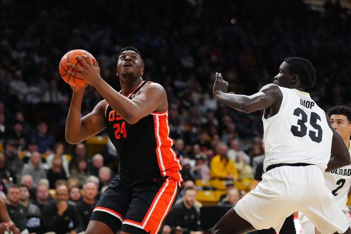 Jan 20, 2024; Boulder, Colorado, USA; Oregon State Beavers center KC Ibekwe (24) and Colorado Buffaloes forward Assane Diop (35) during the first half at the CU Events Center.