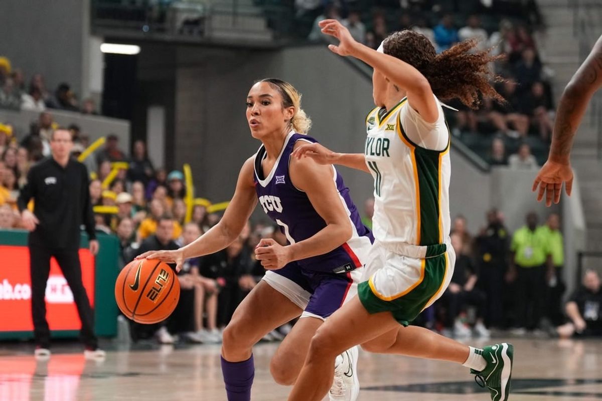 Jan 3, 2024; Waco, Texas, USA;  TCU Horned Frogs guard Jaden Owens (1) controls the ball against Baylor Lady Bears guard Jada Walker (11) during the first half at Paul and Alejandra Foster Pavilion.
