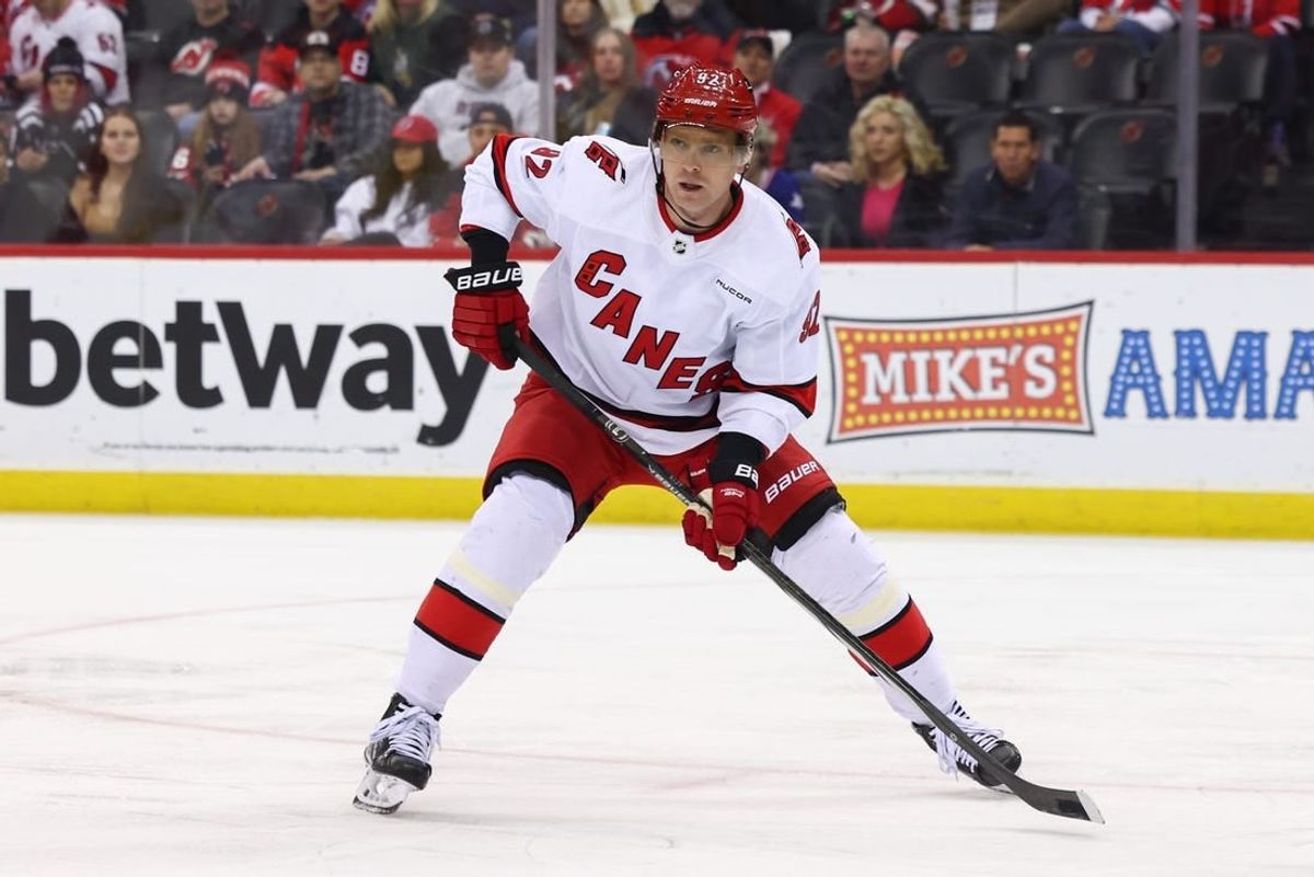 Mar 9, 2024; Newark, New Jersey, USA; Carolina Hurricanes center Evgeny Kuznetsov (92) against the New Jersey Devils during the first period at Prudential Center.