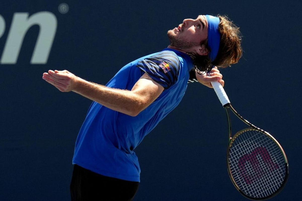 Aug 30, 2023; Flushing, NY, USA; Stefanos Tsitsipas of Greece serves to Dominic Stricker of Switzerland on day three of the 2023 U.S. Open tennis tournament at USTA Billie Jean King National Tennis Center.