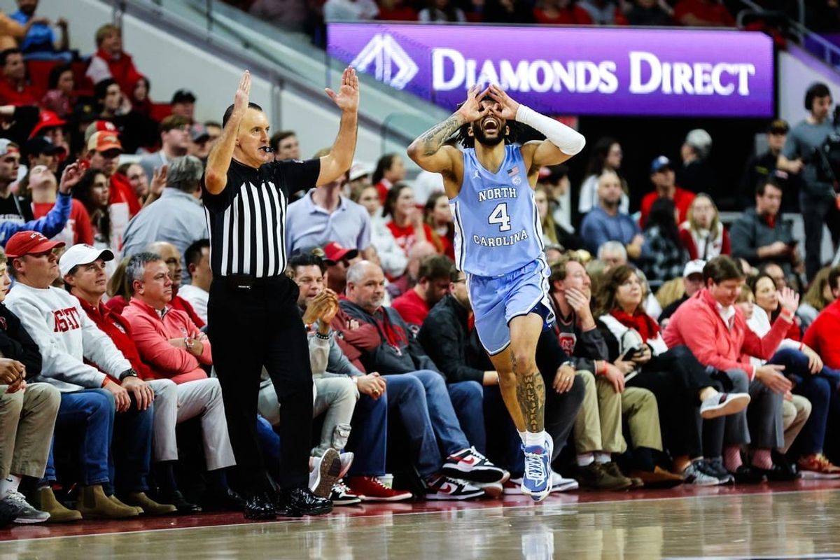 Jan 10, 2024; Raleigh, North Carolina, USA;  North Carolina Tar Heels guard RJ Davis (4) reacts after scoring during the second half against North Carolina State Wolfpack at PNC Arena.
