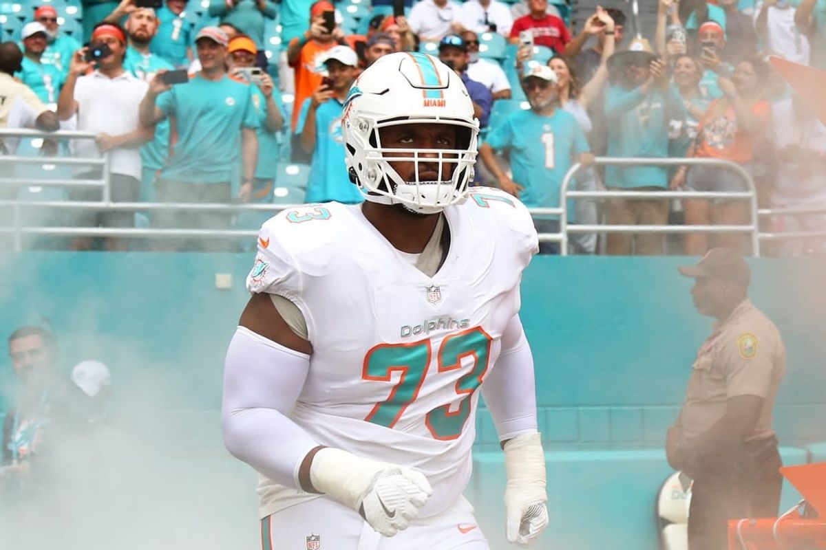 Oct 24, 2021; Miami Gardens, Florida, USA; Miami Dolphins offensive tackle Austin Jackson (73) takes on the field prior the game against the Atlanta Falcons at Hard Rock Stadium.