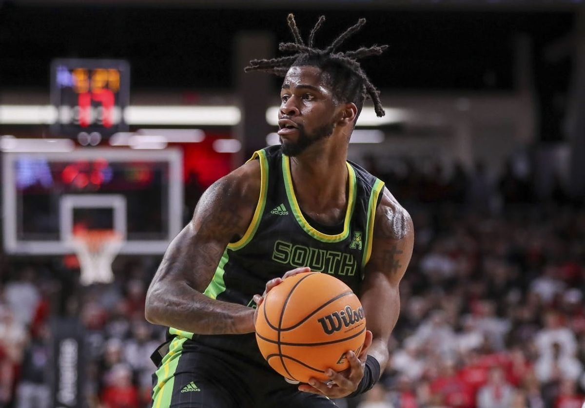 Feb 11, 2023; Cincinnati, Ohio, USA; South Florida Bulls guard Selton Miguel (1) holds the ball against the Cincinnati Bearcats in the second half at Fifth Third Arena.
