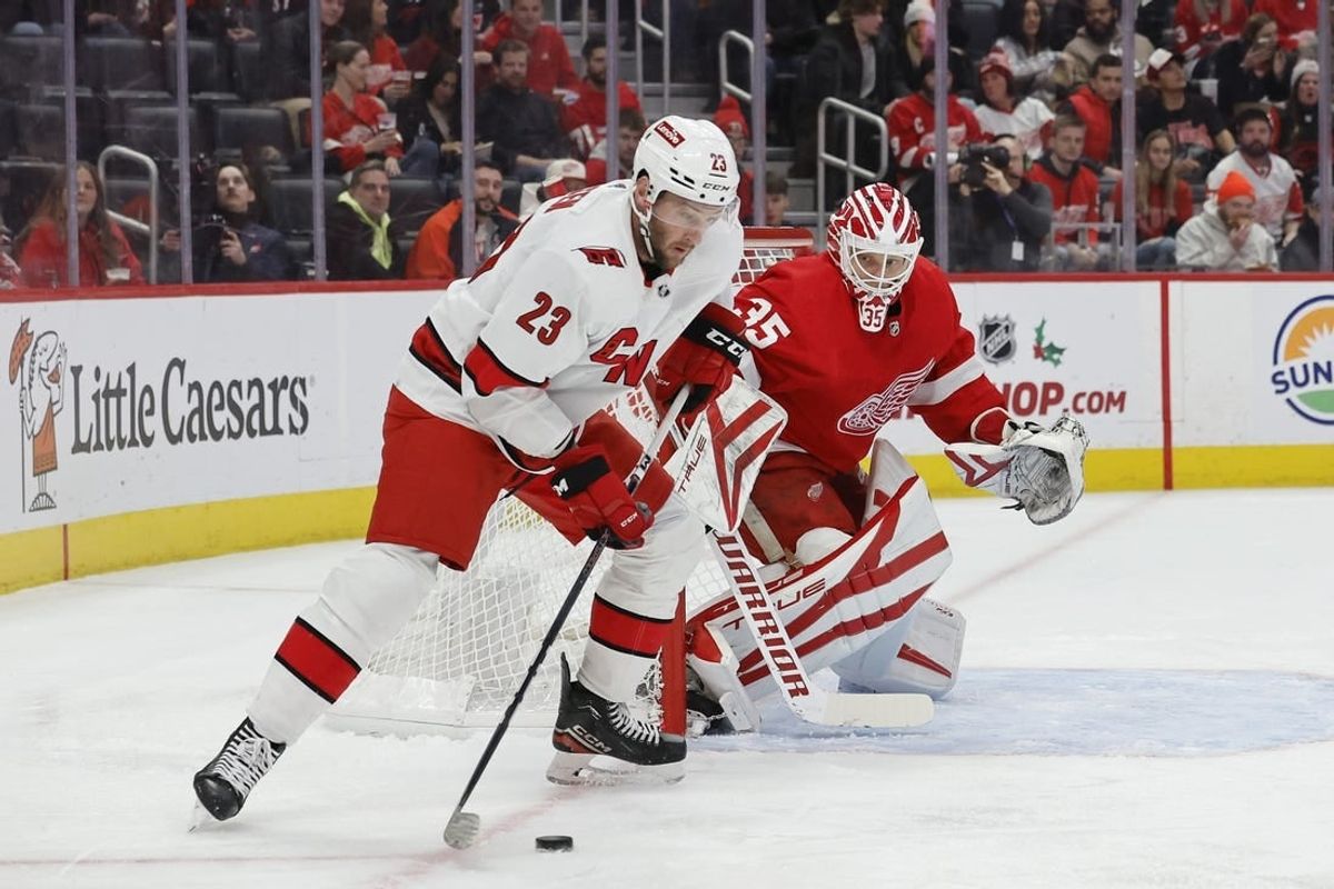 Dec 14, 2023; Detroit, Michigan, USA; Carolina Hurricanes right wing Stefan Noesen (23) skates with the puck in the first period against the Detroit Red Wings at Little Caesars Arena.