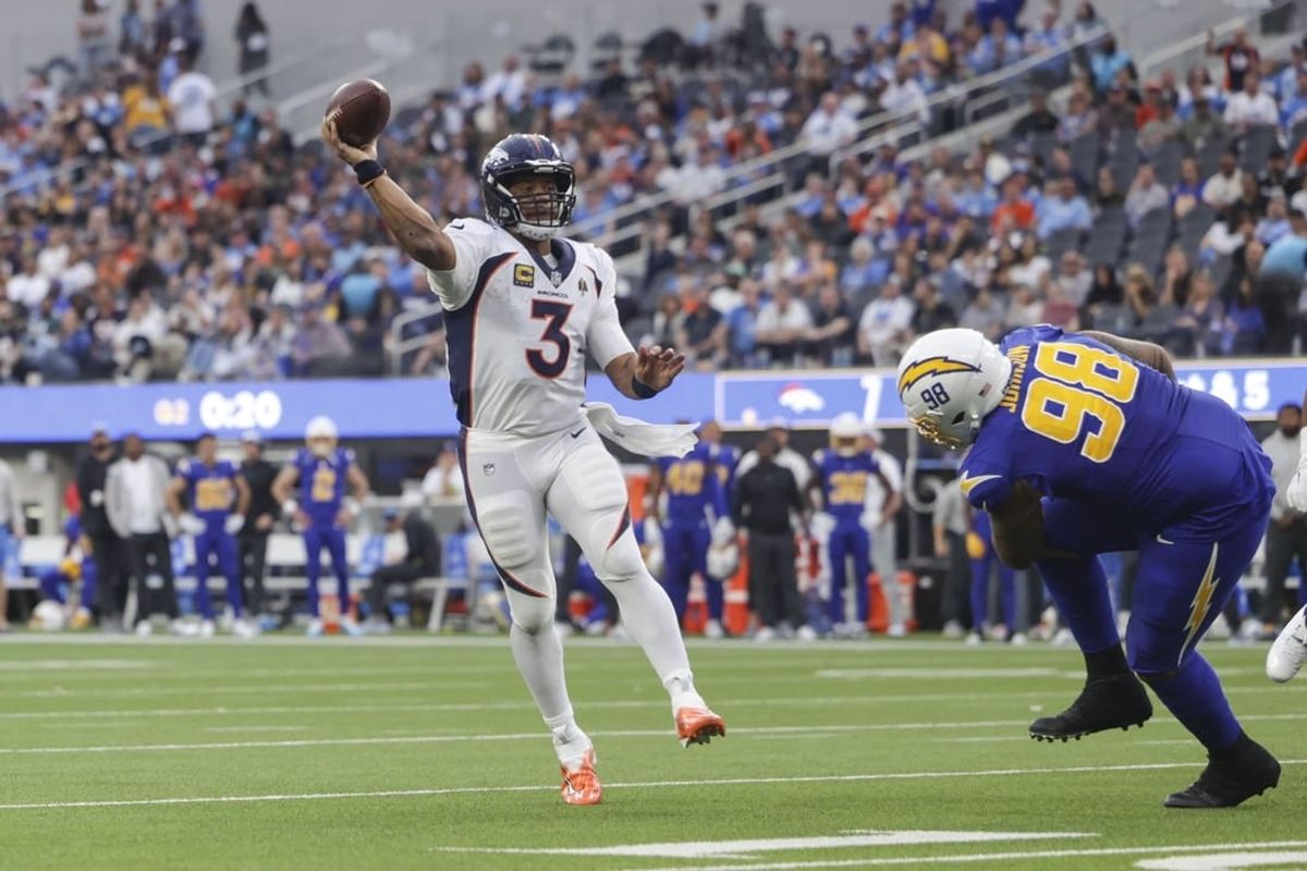 Dec 10, 2023; Inglewood, California, USA; Denver Broncos quarterback Russell Wilson (3) throws the ball during the first half in a game against the Los Angeles Chargers at SoFi Stadium.