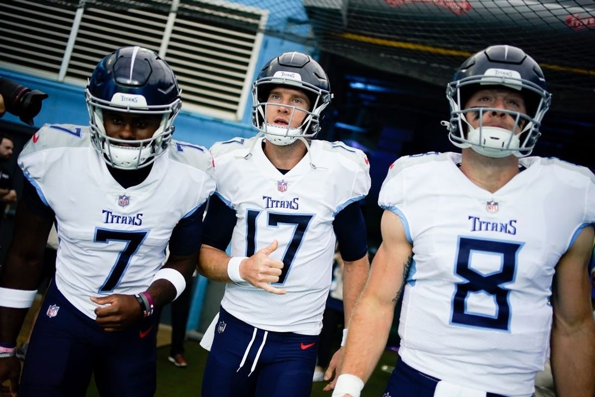 Sep 17, 2023; Nashville, Tennessee, USA; Tennessee Titans quarterbacks Malik Willis (7), Ryan Tannehill (17) and Will Levis (8) head to the field face the Los Angeles Chargers at Nissan Stadium.