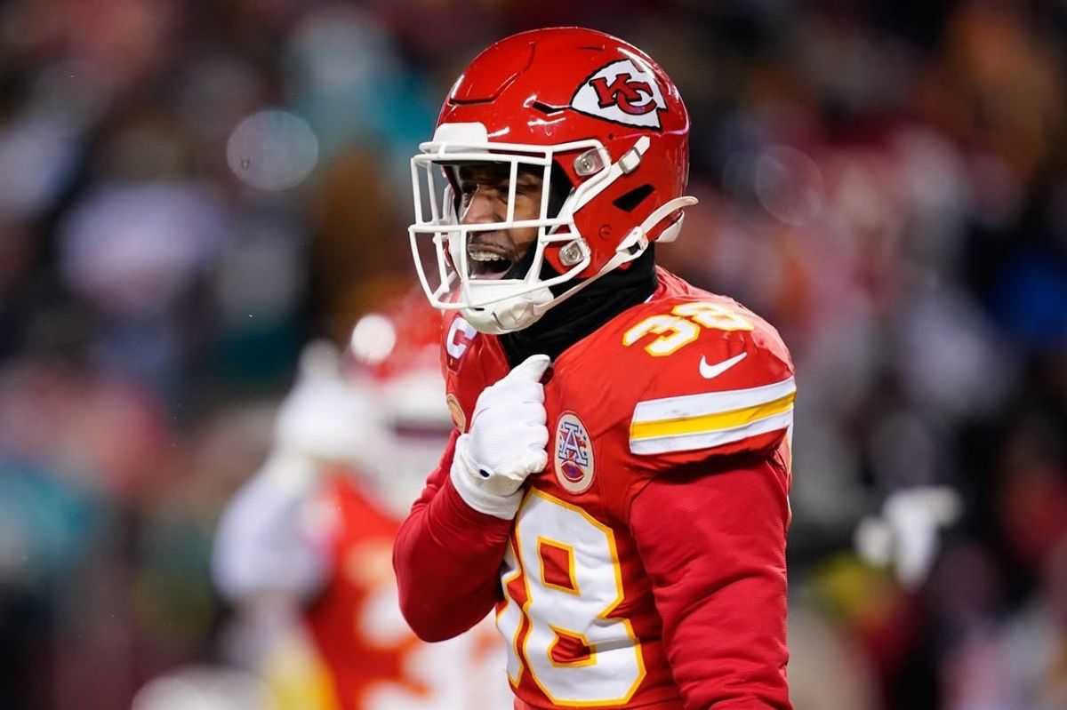 Jan 13, 2024; Kansas City, Missouri, USA; Kansas City Chiefs cornerback L'Jarius Sneed (38) reacts against the Miami Dolphins during the first half of the 2024 AFC wild card game at GEHA Field at Arrowhead Stadium.