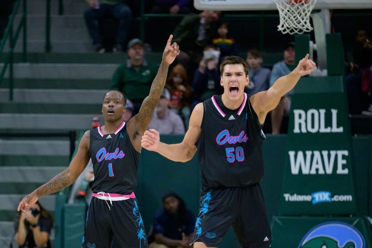 Jan 11, 2024; New Orleans, Louisiana, USA; Florida Atlantic Owls center Vladislav Goldin (50) and Florida Atlantic Owls guard Johnell Davis (1) react during the first half against the Tulane Green Wave at Avron B. Fogelman Arena in Devlin Fieldhouse.