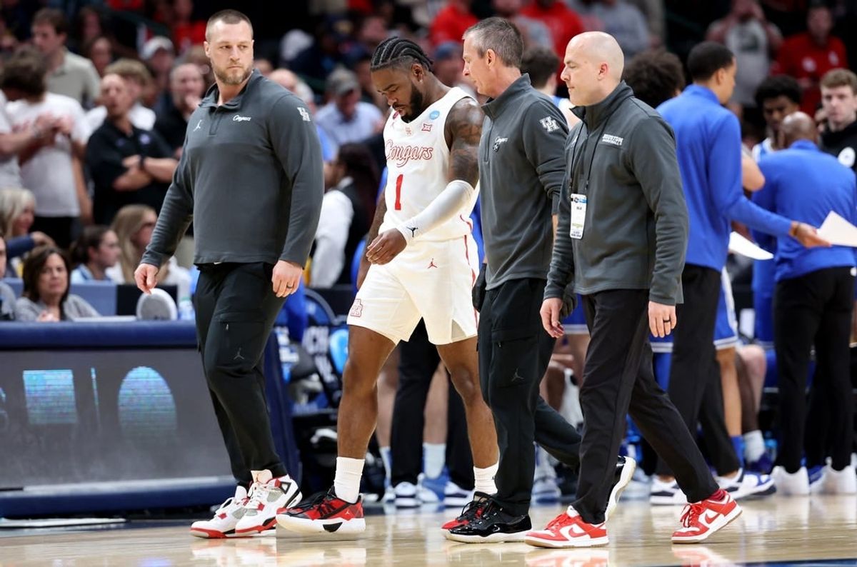 Mar 29, 2024; Dallas, TX, USA; Houston Cougars guard Jamal Shead (1) walks off the floor after an injury during the first half in the semifinals of the South Regional of the 2024 NCAA Tournament against the Duke Blue Devils at American Airlines Center.