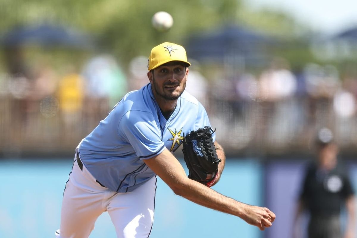 Mar 11, 2024; Port Charlotte, Florida, USA;  Tampa Bay Rays starting pitcher Zach Eflin (24) throws a pitch against the Toronto Blue Jays in the third inning at Charlotte Sports Park.