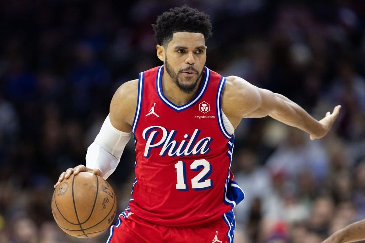 Jan 12, 2024; Philadelphia, Pennsylvania, USA; Philadelphia 76ers forward Tobias Harris (12) dribbles the ball against the Sacramento Kings during the fourth quarter at Wells Fargo Center.