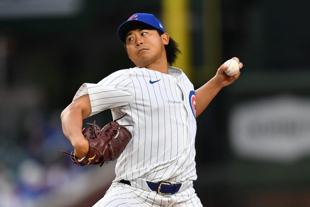 Apr 20, 2024; Chicago, Illinois, USA; Chicago Cubs starting pitcher Shota Imanaga (18) during the first inning against the Miami Marlins at Wrigley Field.