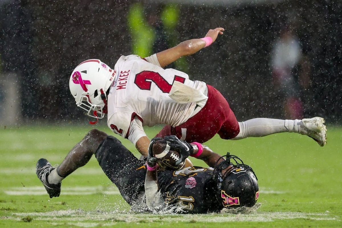 Dec 16, 2023; Orlando, FL, USA;  Appalachian State Mountaineers wide receiver Christan Horn (13) receives a pass guarded byAppalachian State Mountaineers cornerback Tyrek Funderburk (2) in the second quarter during the Avocados from Mexico Cure Bowl at FBC Mortgage Stadium.