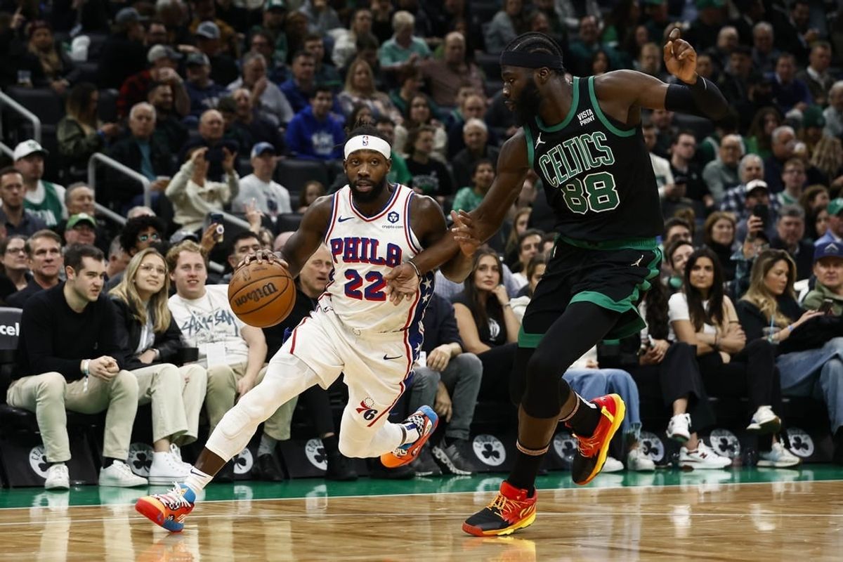 Dec 1, 2023; Boston, Massachusetts, USA; Philadelphia 76ers guard Patrick Beverley (22) drives on Boston Celtics center Neemias Queta (88) during the second quarter at TD Garden.