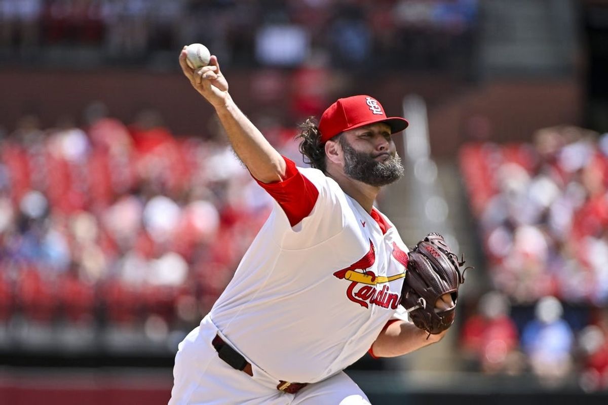May 4, 2024; St. Louis, Missouri, USA;  St. Louis Cardinals starting pitcher Lance Lynn (31) pitches against the Chicago White Sox during the first inning at Busch Stadium.