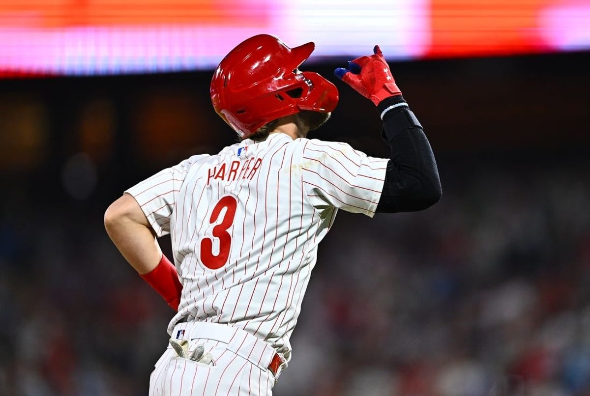 Apr 16, 2024; Philadelphia, Pennsylvania, USA; Philadelphia Phillies first baseman Bryce Harper (3) reacts after hitting a two-run home run against the Colorado Rockies in the eighth inning at Citizens Bank Park.
