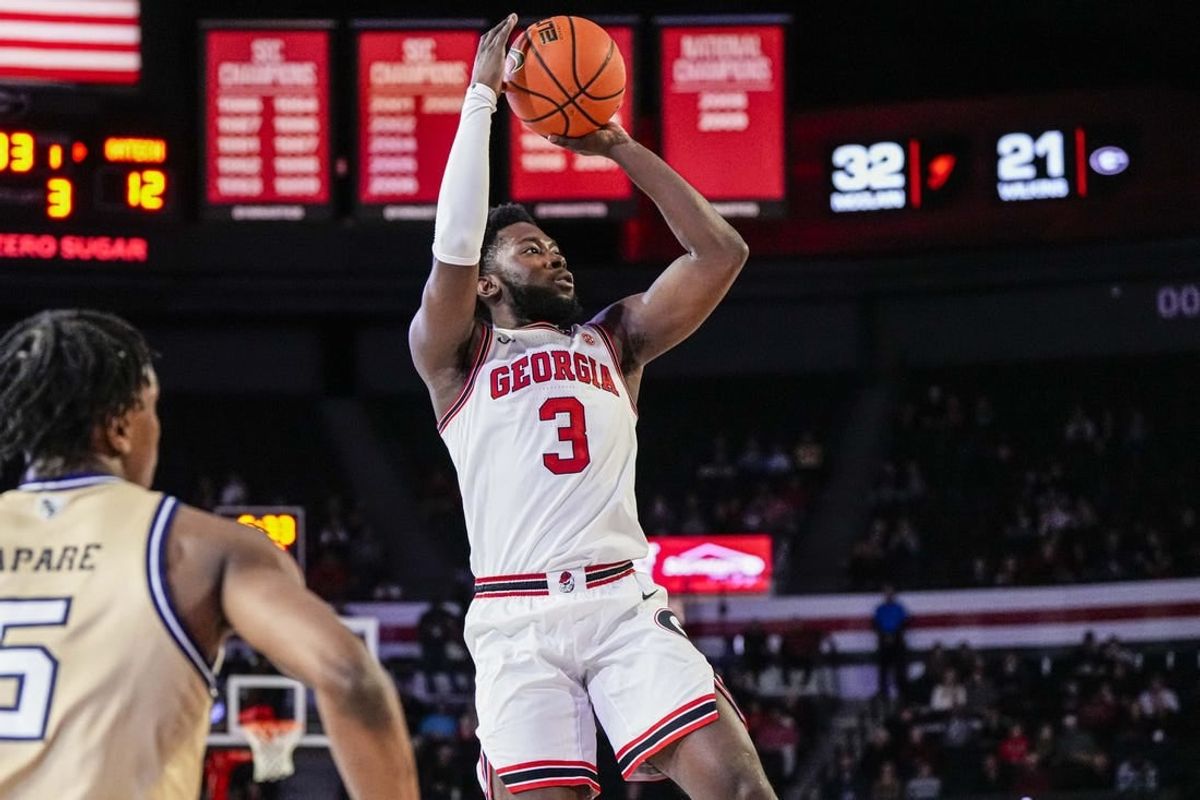 Dec 5, 2023; Athens, Georgia, USA; Georgia Bulldogs guard Noah Thomasson (3) shoots against the Georgia Tech Yellow Jackets during the first half at Stegeman Coliseum.