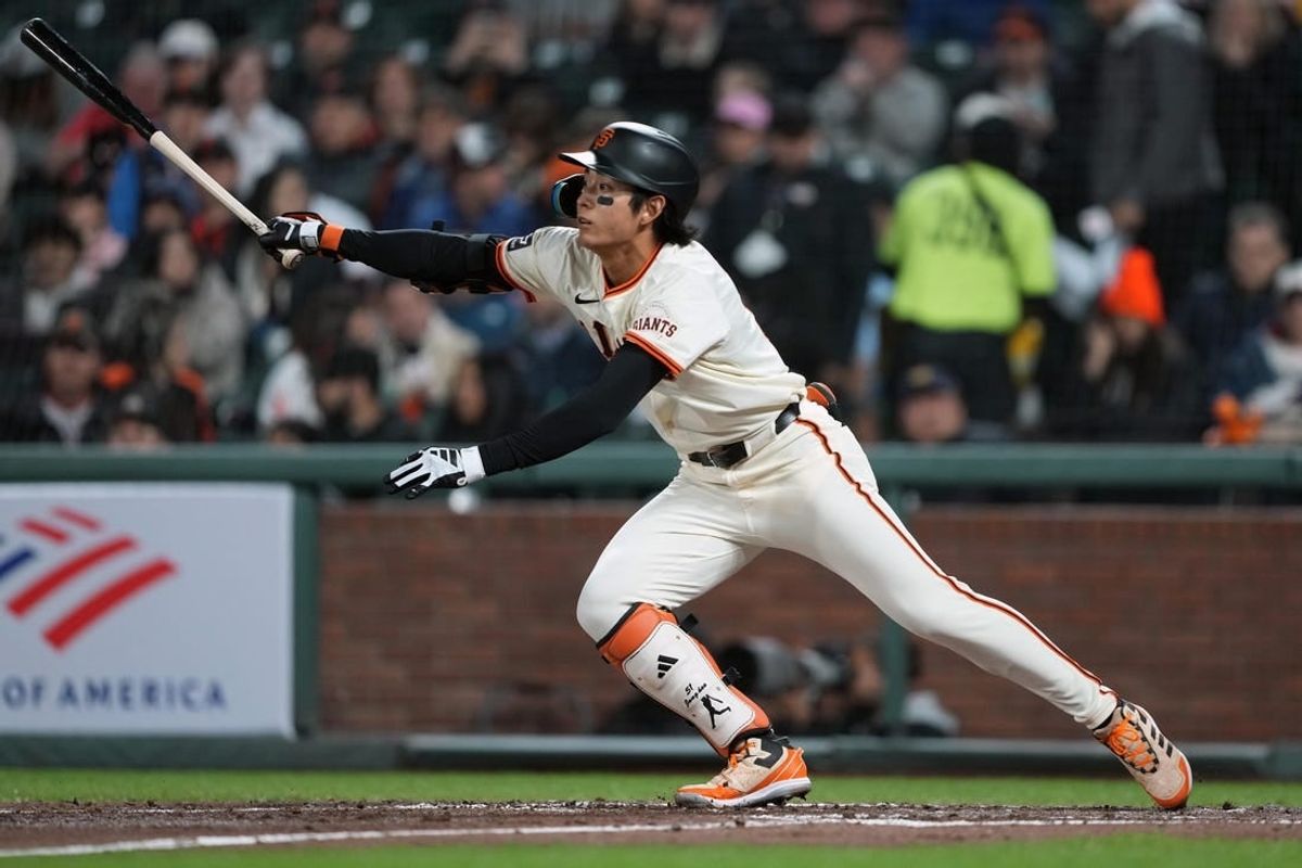 Apr 9, 2024; San Francisco, California, USA; San Francisco Giants center fielder Jung Hoo Lee (51) hits a single against the Washington Nationals during the fifth inning at Oracle Park.