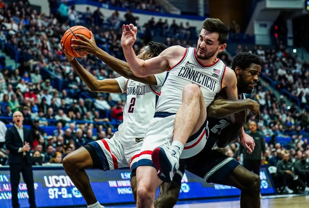 Jan 14, 2024; Hartford, Connecticut, USA; Georgetown Hoyas forward Supreme Cook (24) called for the foul against Connecticut Huskies forward Alex Karaban (11) in the first half at XL Center.