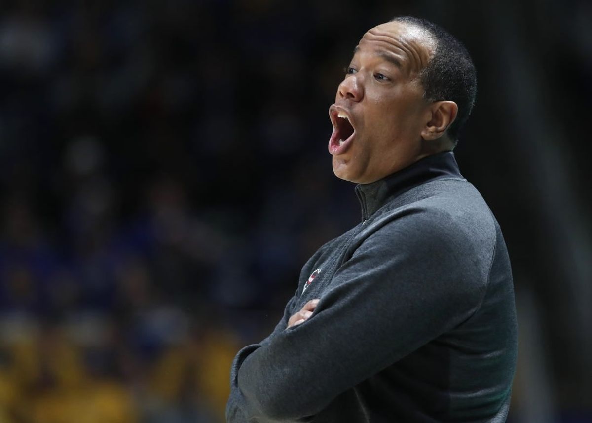 Mar 9, 2024; Pittsburgh, Pennsylvania, USA;  North Carolina State Wolfpack head coach Kevin Keatts reacts on the sidelines against the Pittsburgh Panthers during the first half at the Petersen Events Center.