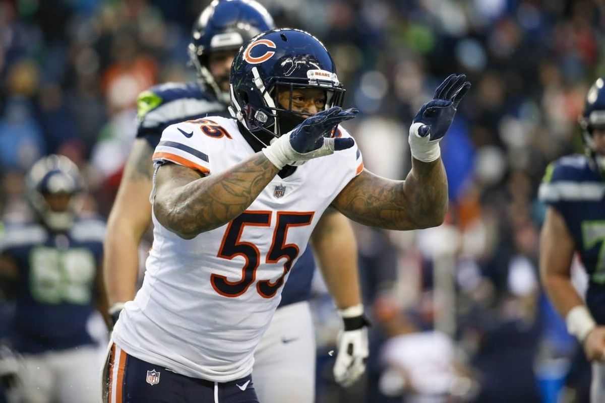 Dec 26, 2021; Seattle, Washington, USA; Chicago Bears linebacker Bruce Irvin (55) celebrates following turnover on downs against the Seattle Seahawks during the fourth quarter at Lumen Field.