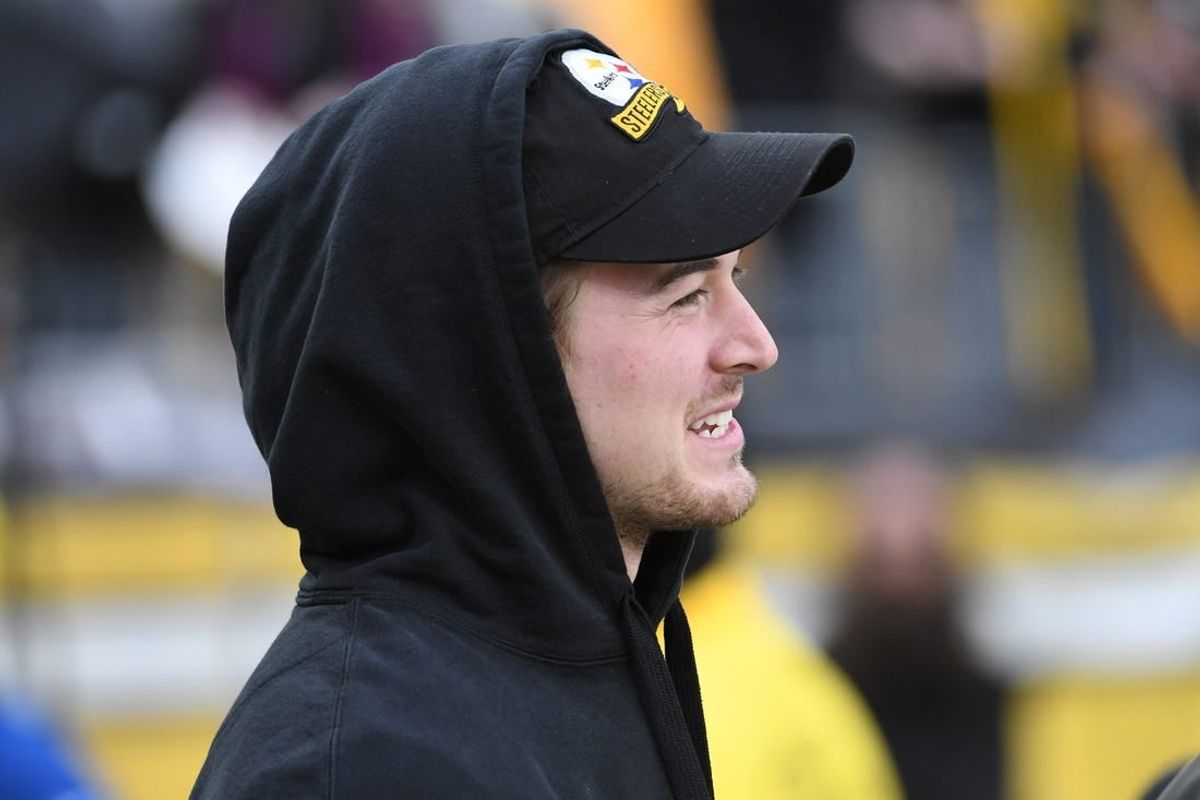 Dec 23, 2023; Pittsburgh, Pennsylvania, USA;  Pittsburgh Steelers quarterback Kenny Pickett (8) watches from the sidelines before a game against the Cincinnati Bengals at Acrisure Stadium.