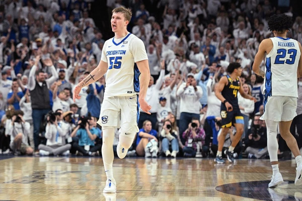 Mar 2, 2024; Omaha, Nebraska, USA; Creighton Bluejays guard Baylor Scheierman (55) celebrates a three point basket against the Marquette Golden Eagles in the second half at CHI Health Center Omaha.
