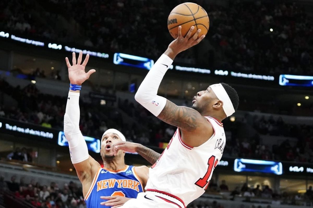 Apr 9, 2024; Chicago, Illinois, USA; New York Knicks guard Josh Hart (3) defends Chicago Bulls forward Torrey Craig (13) during the first quarter at United Center.