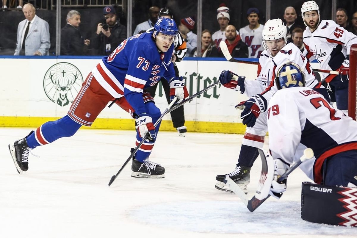 Apr 21, 2024; New York, New York, USA; New York Rangers center Matt Rempe (73) scores a goal in the second period against the Washington Capitals in game one of the first round of the 2024 Stanley Cup Playoffs at Madison Square Garden.