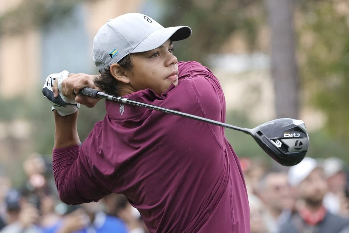 Dec 17, 2023; Orlando, Florida, USA;  Charlie Woods plays his shot from the first tee during the PNC Championship at The Ritz-Carlton Golf Club.