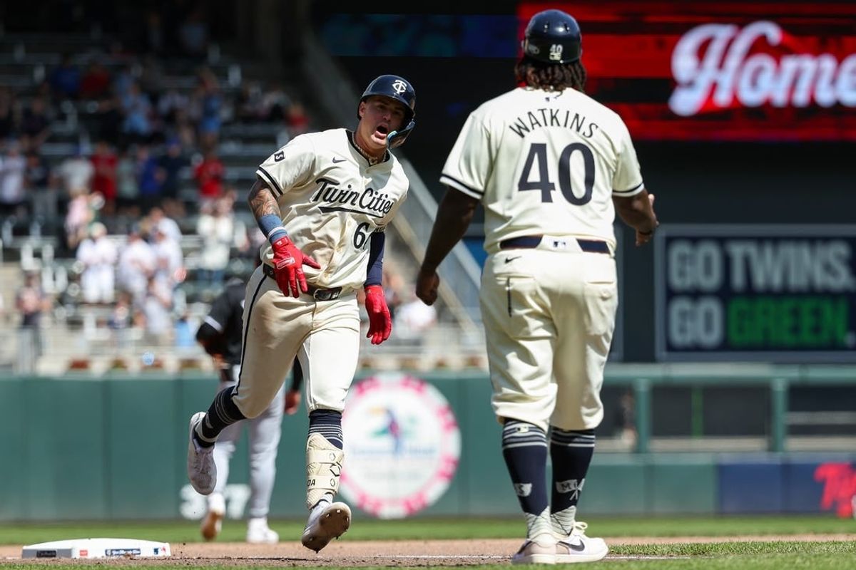 Apr 25, 2024; Minneapolis, Minnesota, USA; Minnesota Twins Jose Miranda (64) celebrates his solo home run against the Chicago White Sox during the eighth inning at Target Field.