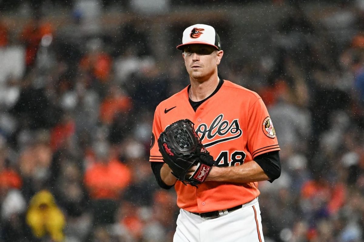 Sep 30, 2023; Baltimore, Maryland, USA;  Baltimore Orioles starting pitcher Kyle Gibson (48) stands on the pitcher's mound as rain falls during the second inning against the Boston Red Sox at Oriole Park at Camden Yards.