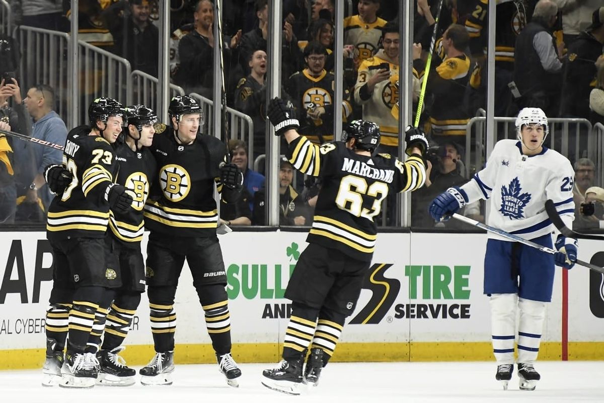 Apr 20, 2024; Boston, Massachusetts, USA; Boston Bruins left wing Jake DeBrusk (74) celebrates his goal with his teammates during the second period in game one of the first round of the 2024 Stanley Cup Playoffs against the Toronto Maple Leafs at TD Garden.