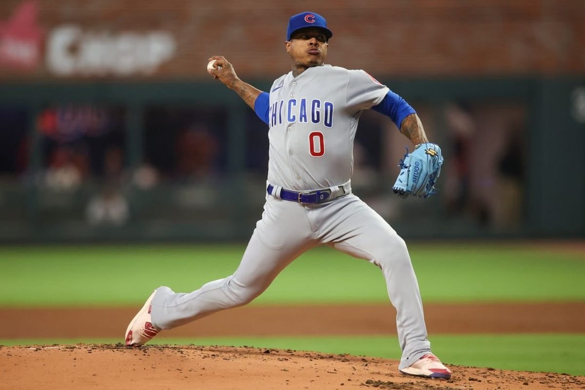 Sep 28, 2023; Atlanta, Georgia, USA; Chicago Cubs starting pitcher Marcus Stroman (0) throws against the Atlanta Braves in the first inning at Truist Park.