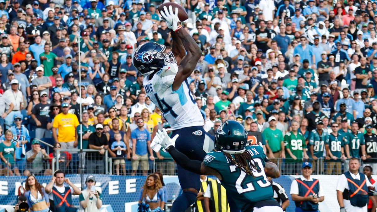 Corey Davis catches the game-winning touchdown in overtime in the Titans win over the Eagles on Sunday.