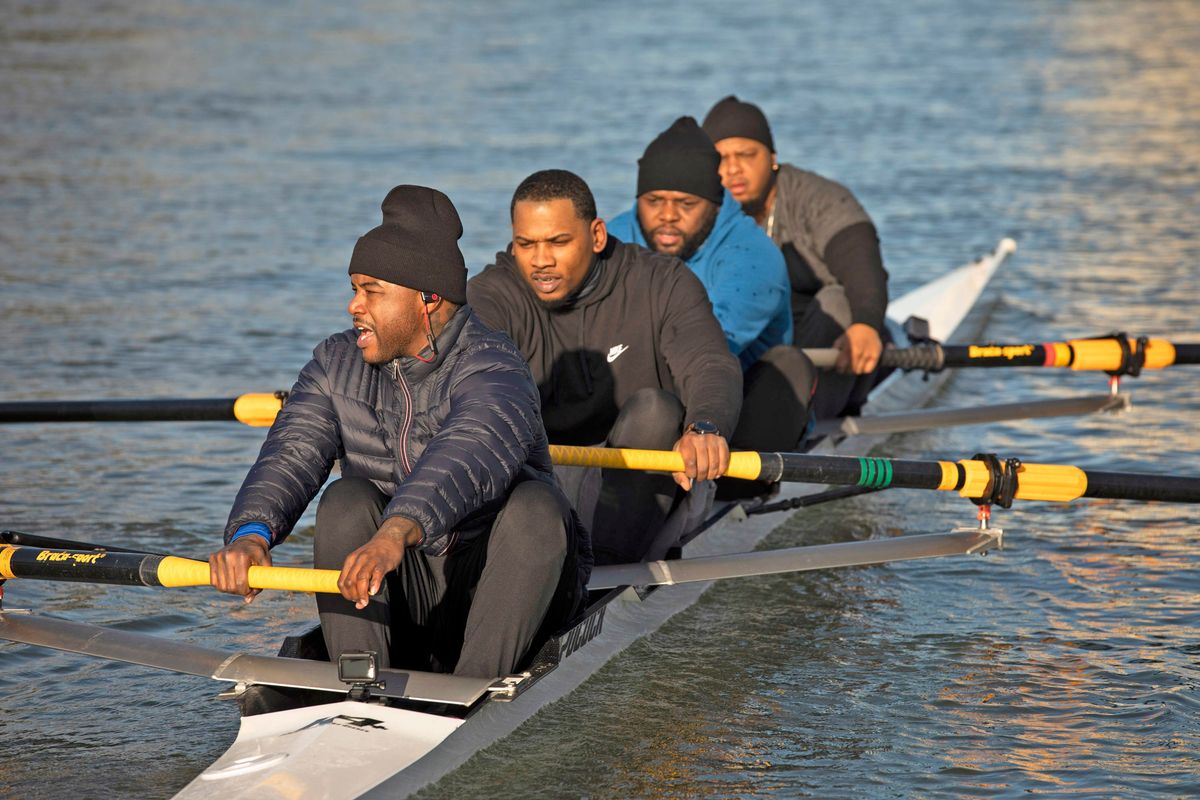The Manley Team (Arshay Cooper in blue sweatshir) on the water in Oakland.