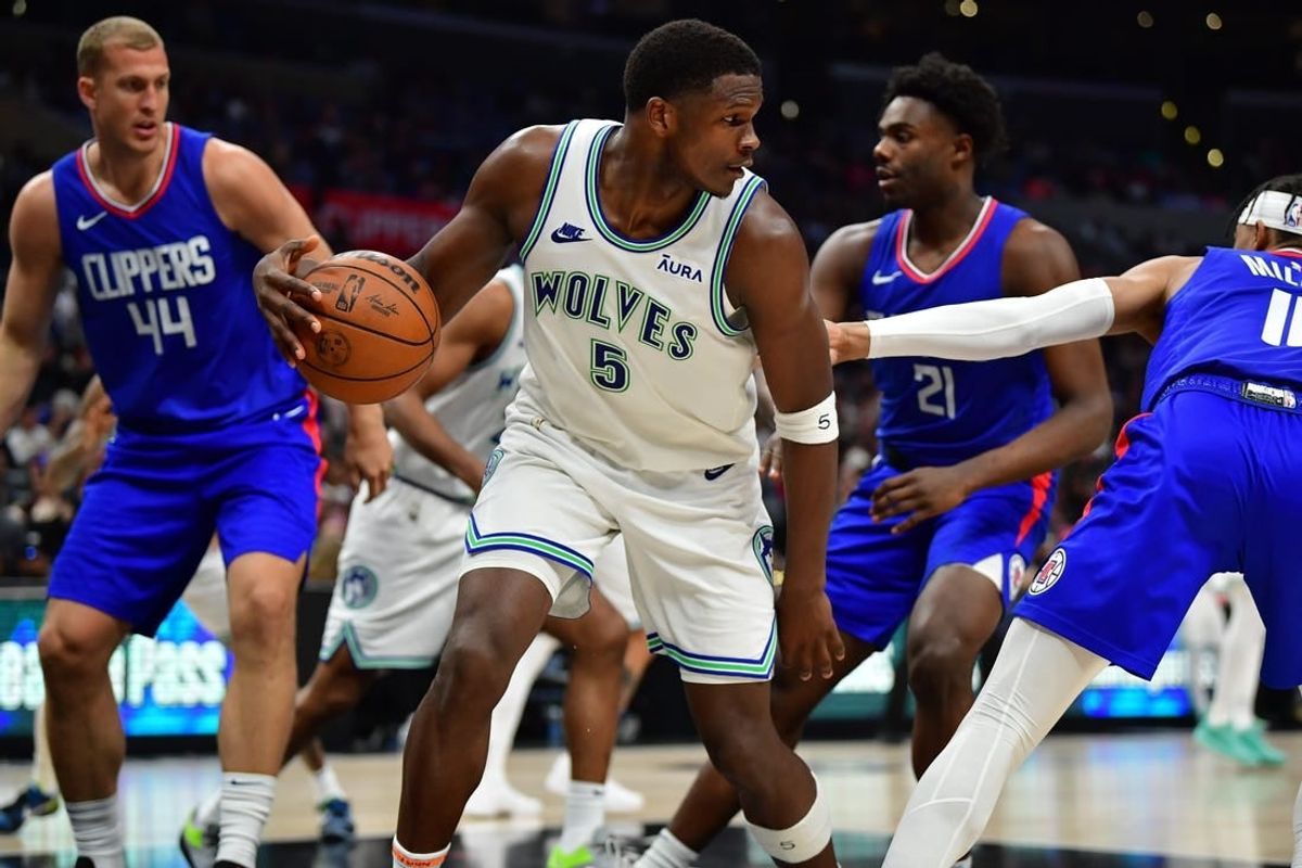 Mar 12, 2024; Los Angeles, California, USA; Minnesota Timberwolves guard Anthony Edwards (5) controls the ball against the Los Angeles Clippers during the second half at Crypto.com Arena.