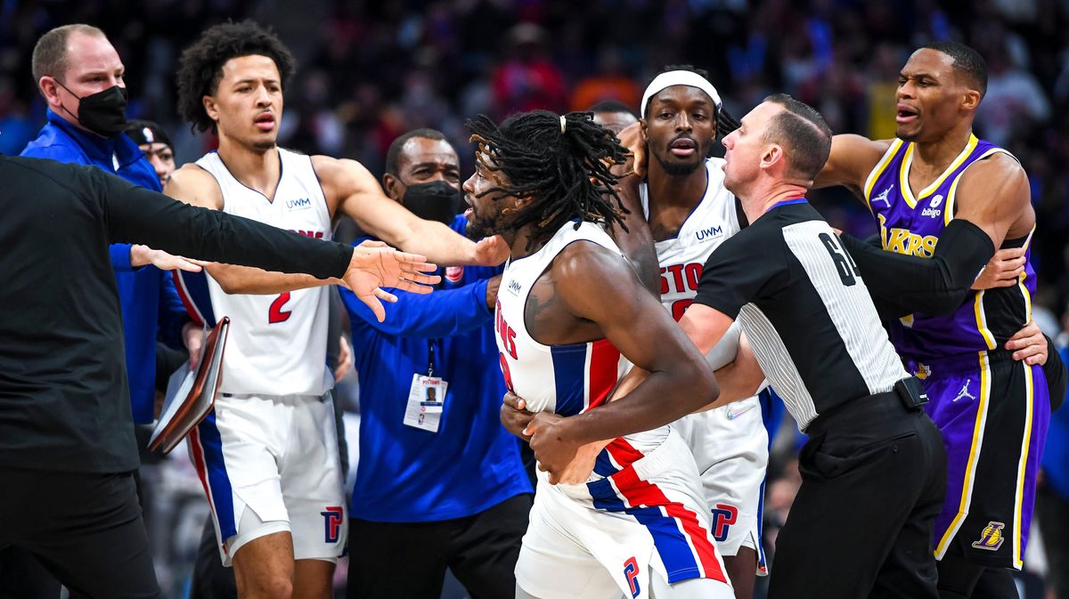 Teammates, coaches, and officials attempt to de-escalate the situation between Isaiah Stewart and LeBron James in Detroit.